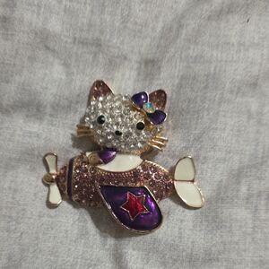 Cute Betsey Jonhson Hello Kitty Brooch with Purple and Gold Accents